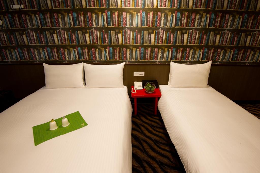 Postel nebo postele na pokoji v ubytování Hotel 6 - ZhongHua