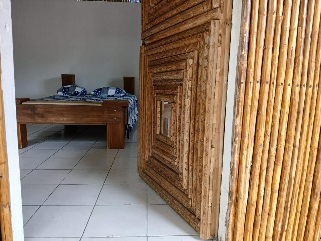 Postel nebo postele na pokoji v ubytování Camping Babsita-TIPI und Hütten und Stellplätze für Zelt und Camper direkt am Meer und See