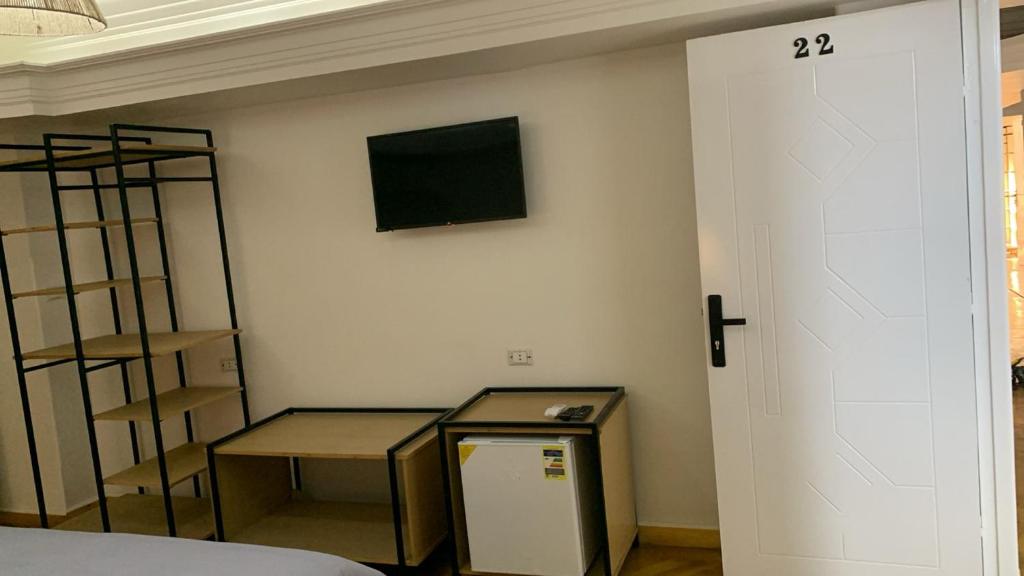 TV a/nebo společenská místnost v ubytování Pyramids Nights Hostel