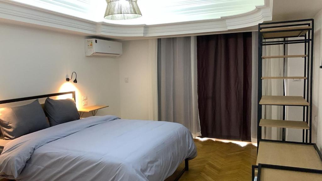 Postel nebo postele na pokoji v ubytování Pyramids Nights Hostel