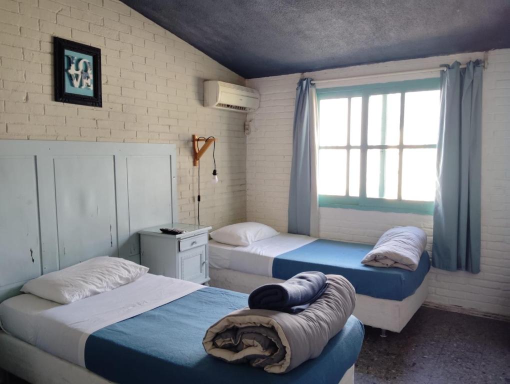 PASTORA Suites & Hostel - Punta del este - Vierbettzimmer Mit Bad