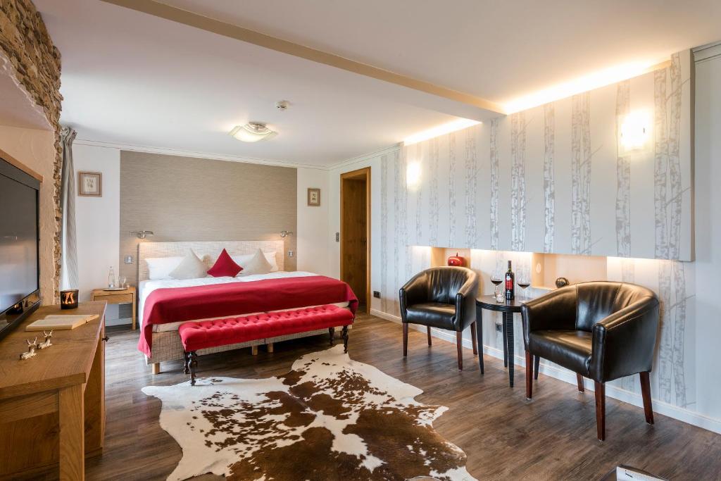 Postel nebo postele na pokoji v ubytování Der Westerhof Hotel