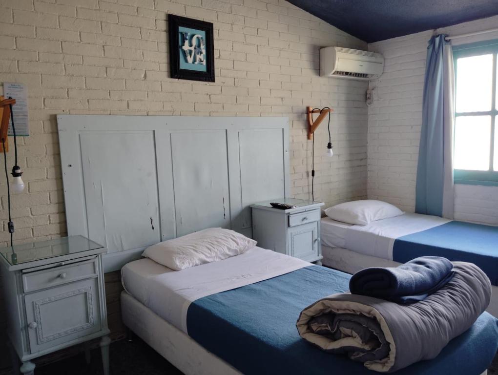 PASTORA Suites & Hostel - Punta del este - Standard-Dreibettzimmer