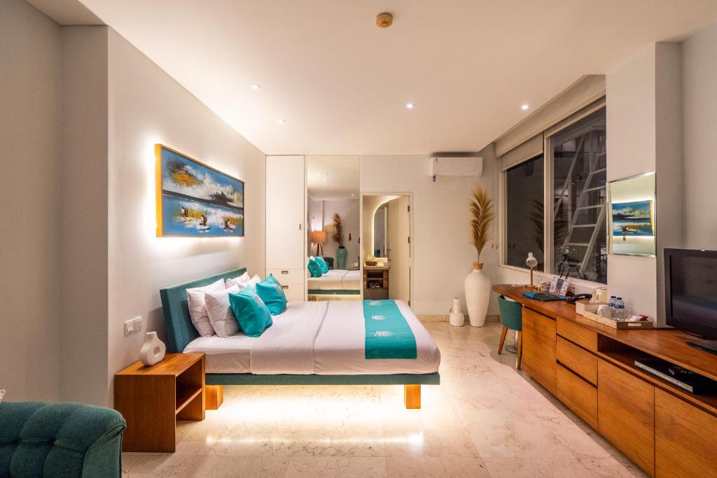 TV a/nebo společenská místnost v ubytování AQ-VA Hotel & Villas Seminyak