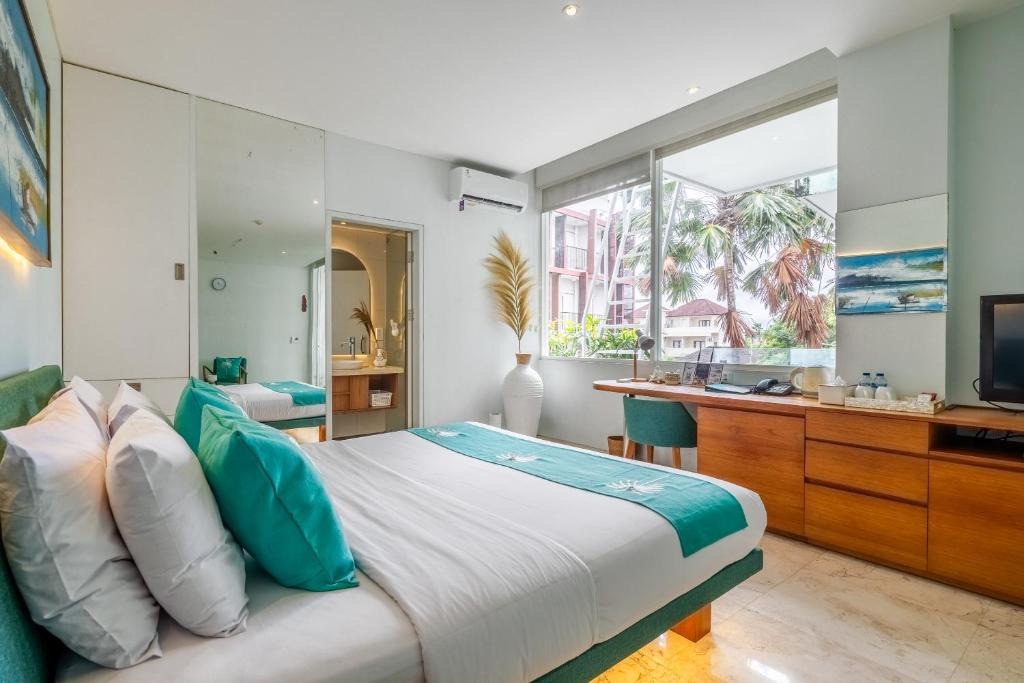 TV a/nebo společenská místnost v ubytování AQ-VA Hotel & Villas Seminyak