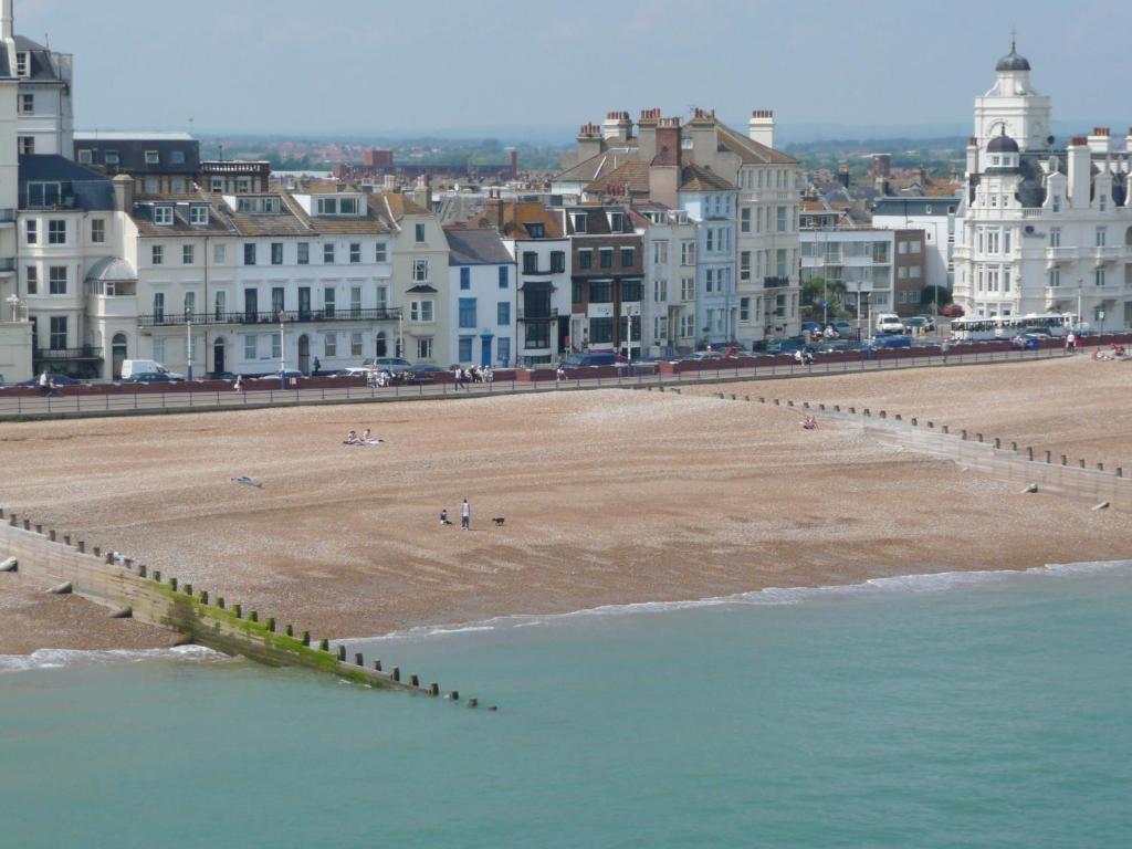 a view of a beach with buildings and a city at Royal Hotel (Adults Only) in Eastbourne