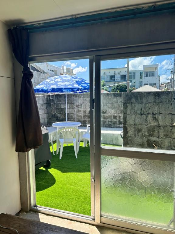 Αίθριο ή υπαίθριος χώρος στο 民宿ひじゃぐゎー