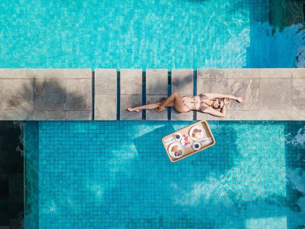 Bazén v ubytování AQ-VA Hotel & Villas Seminyak nebo v jeho okolí