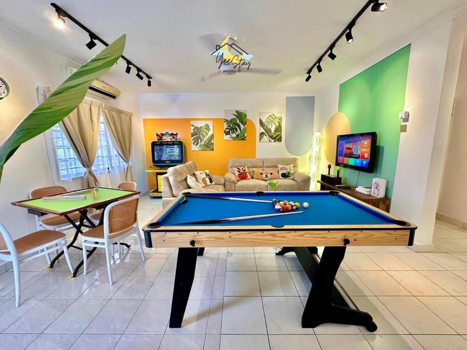 a living room with a pool table in it at 8pax3minsdrivetoJonkerTownArea in Melaka