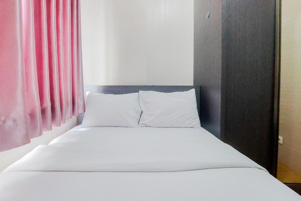 Фотография из галереи Good and Cozy Stay 2BR Serpong Greenview Apartment By Travelio в городе Тангеранг