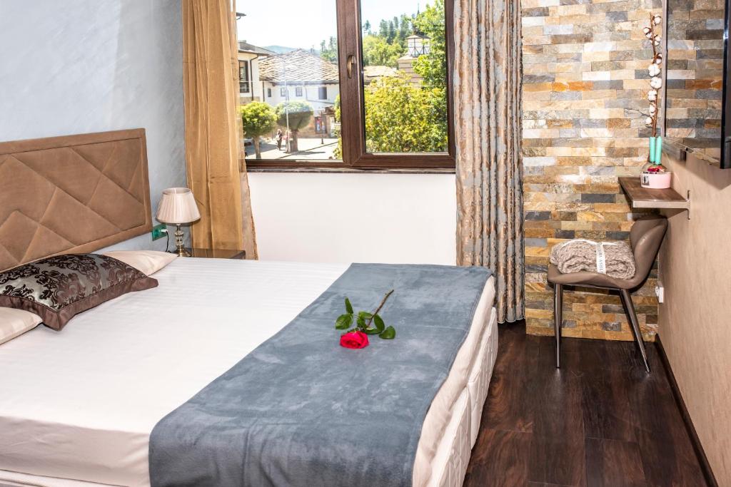 Postel nebo postele na pokoji v ubytování Enika Hotel