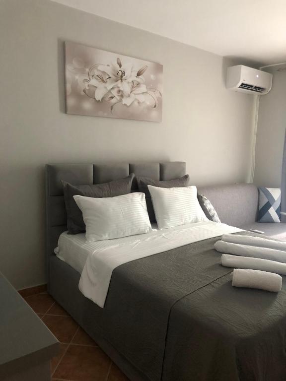 Postel nebo postele na pokoji v ubytování Apartament Raci