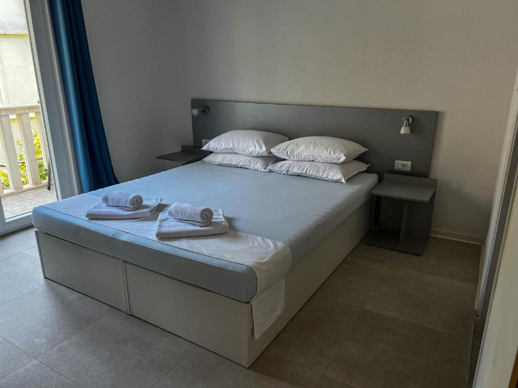 Postel nebo postele na pokoji v ubytování Pansion Palme