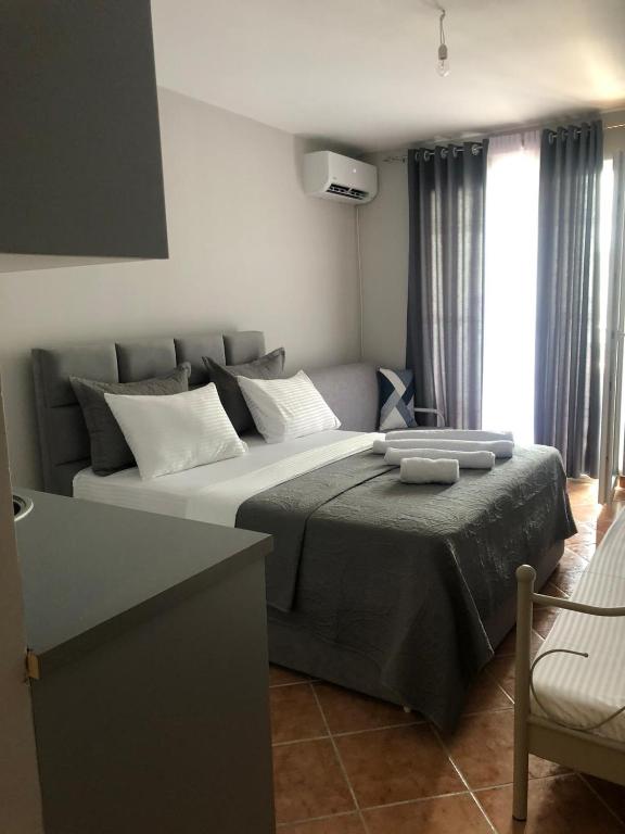 Postel nebo postele na pokoji v ubytování Apartament Raci