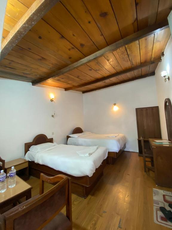 Postel nebo postele na pokoji v ubytování Sun Rise Cottage