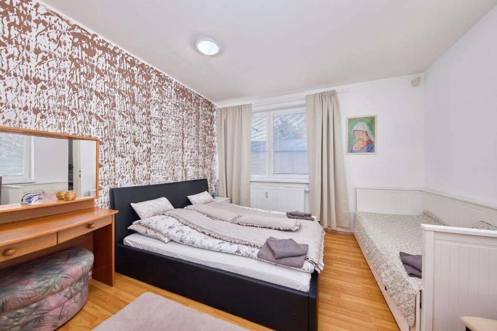 Ένα ή περισσότερα κρεβάτια σε δωμάτιο στο Cutie apartment