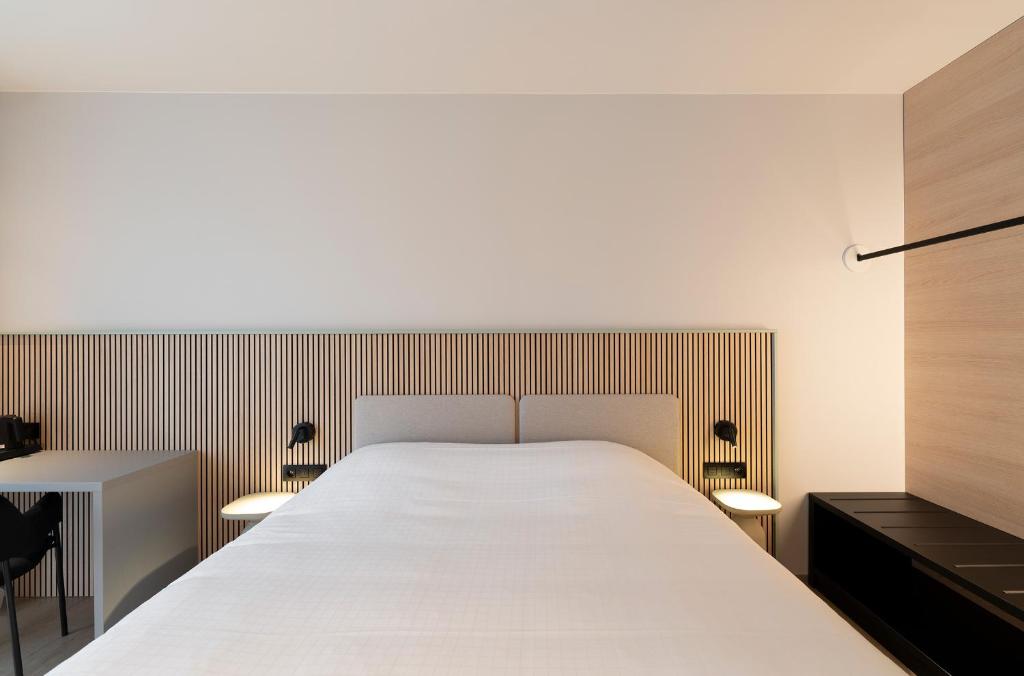 Postel nebo postele na pokoji v ubytování Parkhotel Izegem