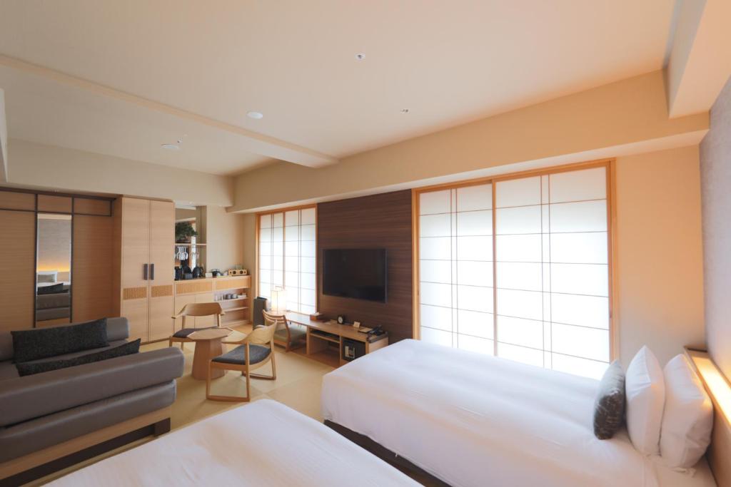 TV a/nebo společenská místnost v ubytování Hotel Niwa Tokyo