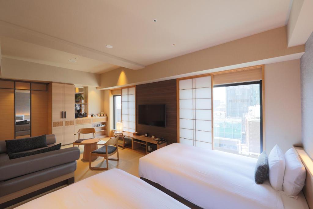 TV a/nebo společenská místnost v ubytování Hotel Niwa Tokyo
