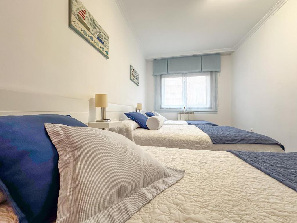Posteľ alebo postele v izbe v ubytovaní Apartamento completo, amplio, muy iluminado y con plaza de garaje incluida.