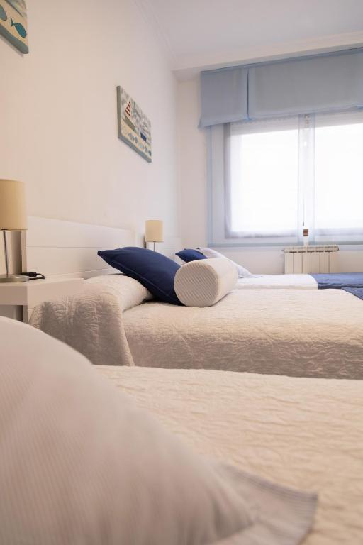 Posteľ alebo postele v izbe v ubytovaní Apartamento completo, amplio, muy iluminado y con plaza de garaje incluida.