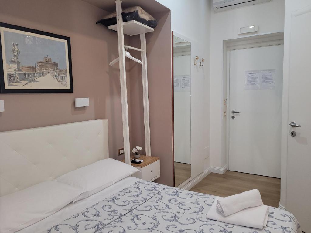 Postel nebo postele na pokoji v ubytování Evergreen