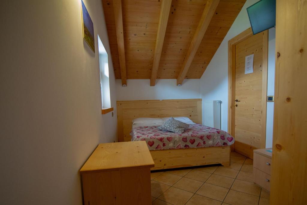 Posteľ alebo postele v izbe v ubytovaní Rifugio Pranolz