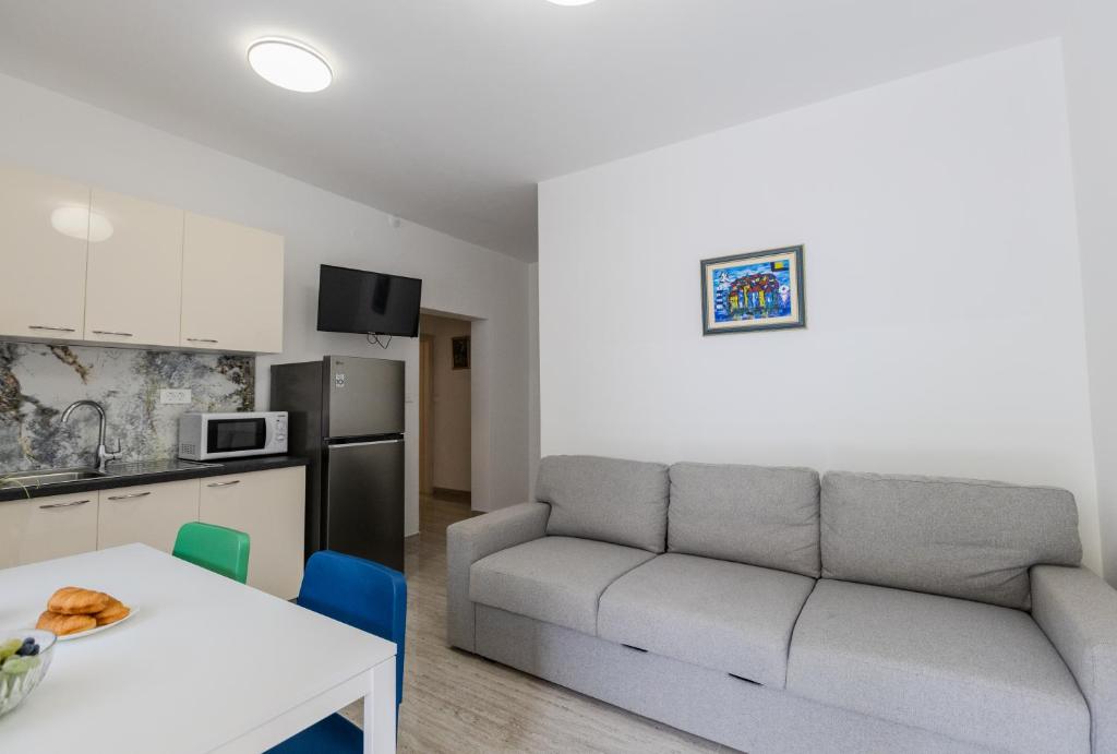 Kuchyň nebo kuchyňský kout v ubytování Apartments Lorena