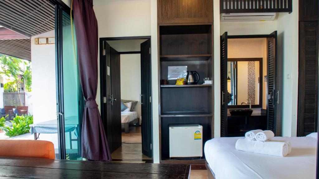 Postel nebo postele na pokoji v ubytování Chidlom Resort