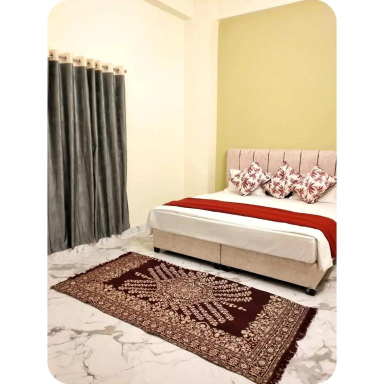 Postel nebo postele na pokoji v ubytování Hotel Sai 9 Heaven