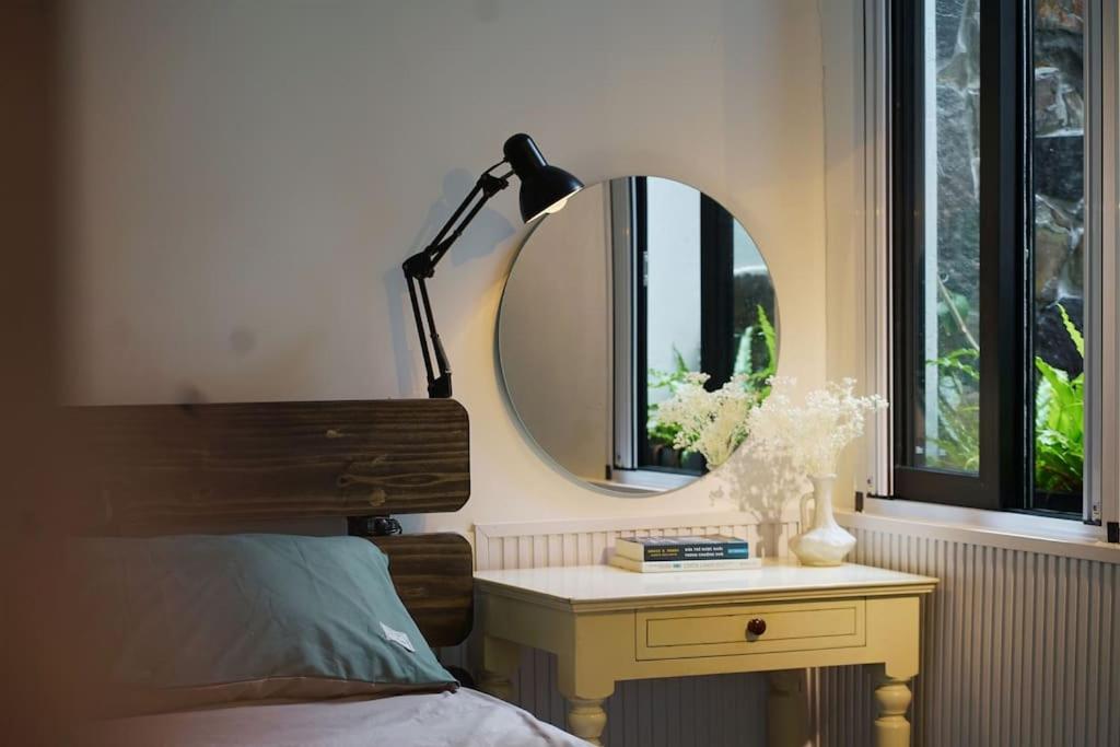 Postel nebo postele na pokoji v ubytování Thỏ Non Garden - Bảo Lộc Center #3BR