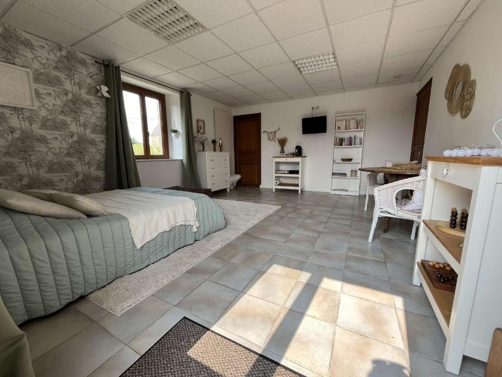 Ένα ή περισσότερα κρεβάτια σε δωμάτιο στο Chambre a la campagne