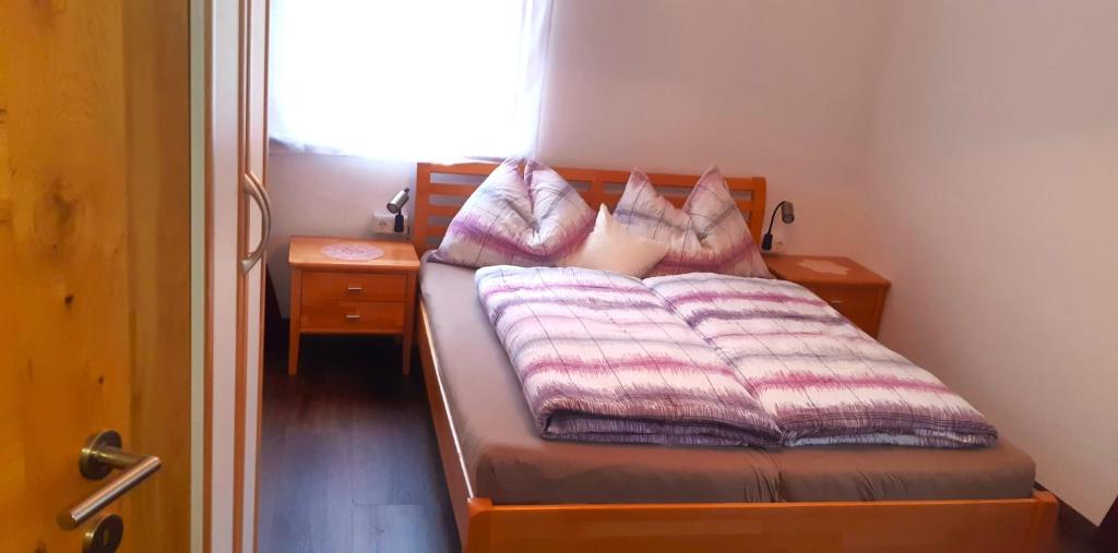 Postel nebo postele na pokoji v ubytování Gästehaus Steinerhof
