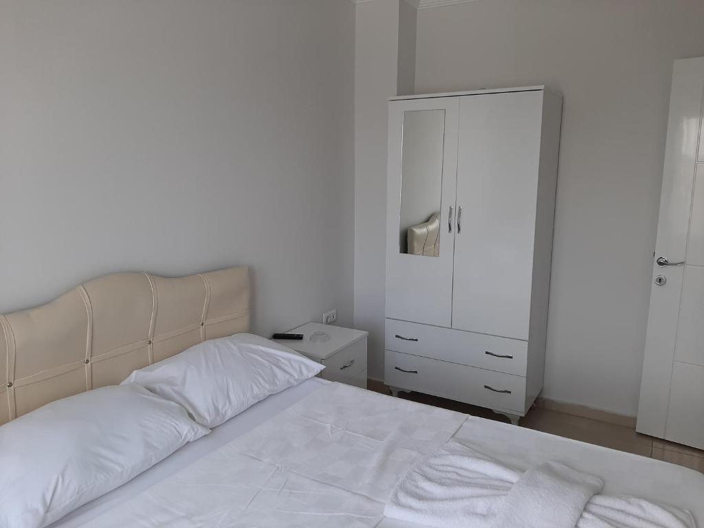 Postel nebo postele na pokoji v ubytování Antiocha Residence