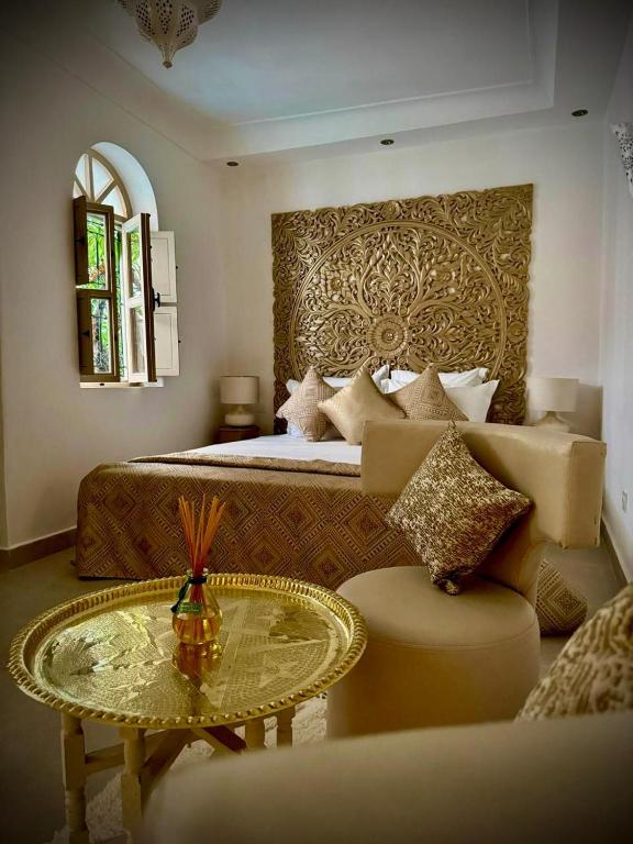 Posezení v ubytování Riad Dollar Des Sables & Spa