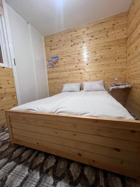 Postel nebo postele na pokoji v ubytování Tikida house
