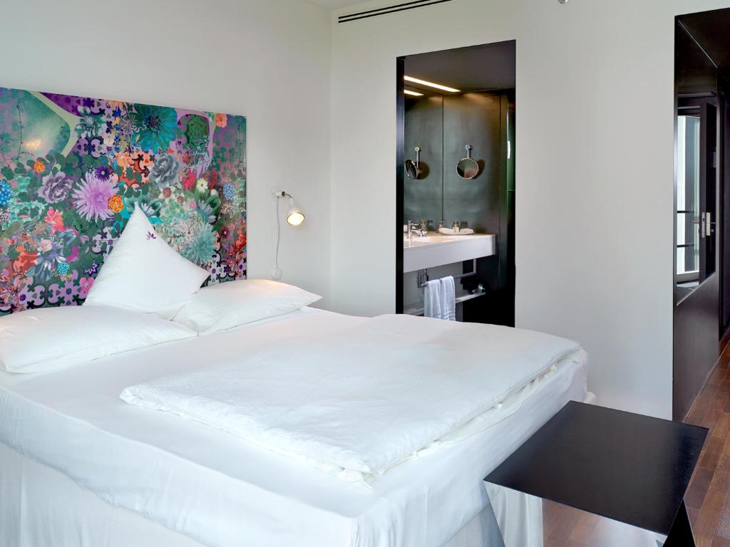 Postel nebo postele na pokoji v ubytování City Garden Hotel