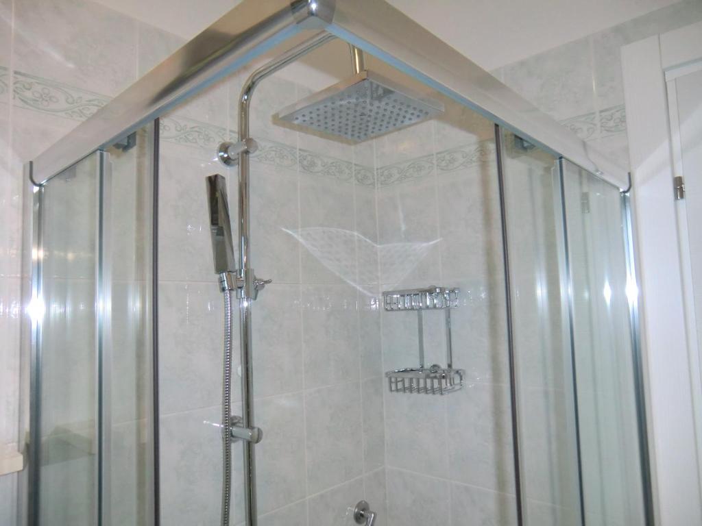 Ванная комната в Residence Villaggio dei Fiori con Piscina e Posto Spiaggia Incluso