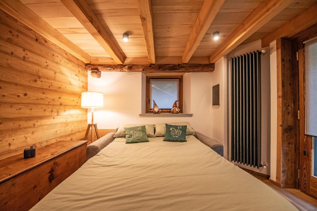 Postel nebo postele na pokoji v ubytování Chalet 181 - Aosta Valley Mountain Stay
