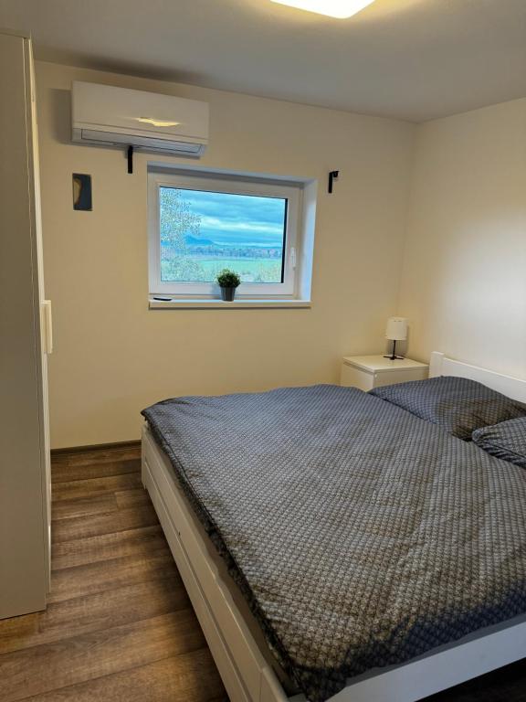Postel nebo postele na pokoji v ubytování Apartmán 2 Jägerhaus