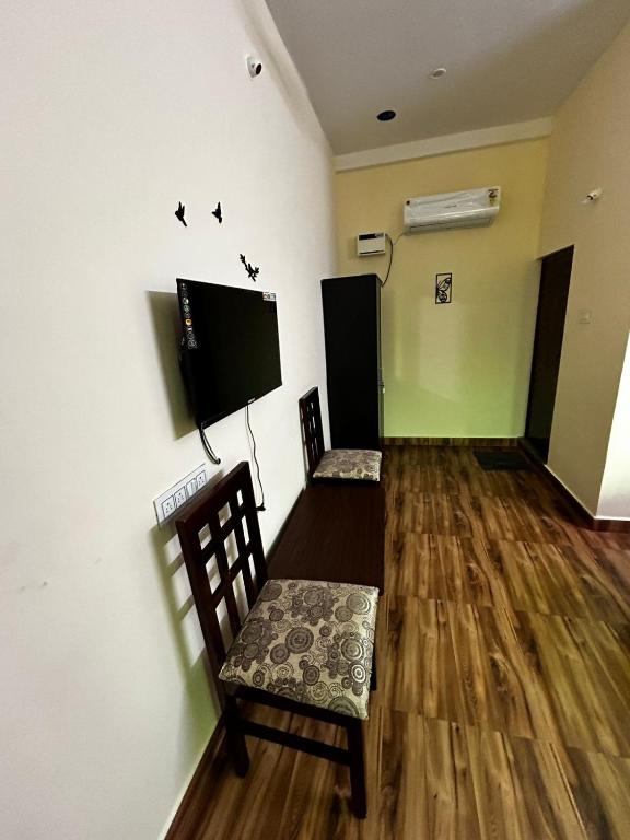 TV a/nebo společenská místnost v ubytování Le'SAP Beach resort