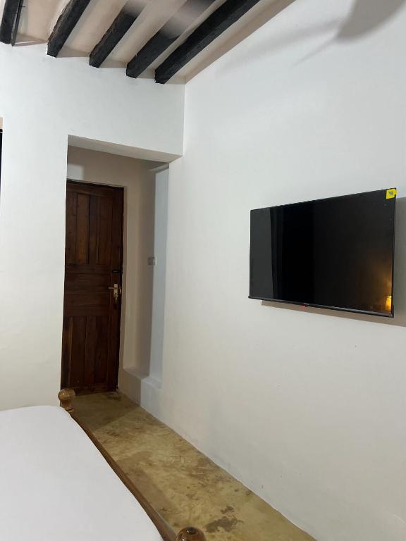 TV a/nebo společenská místnost v ubytování Pole pole house