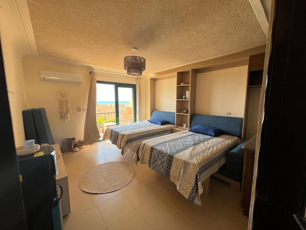 Postel nebo postele na pokoji v ubytování Art Home - La Hacienda, Ras Sudr