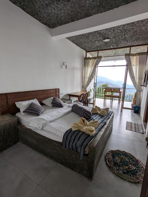 Postel nebo postele na pokoji v ubytování Rock Paradise Homestay