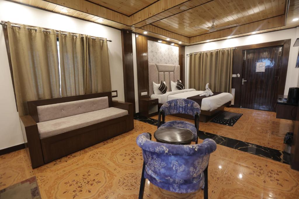 Posezení v ubytování StudioZ Paradise Hills Mussoorie
