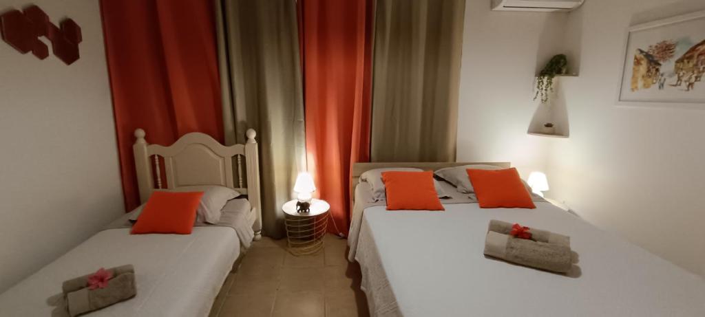 Postel nebo postele na pokoji v ubytování Le Voyageur