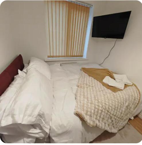Postel nebo postele na pokoji v ubytování Kingdom Residence