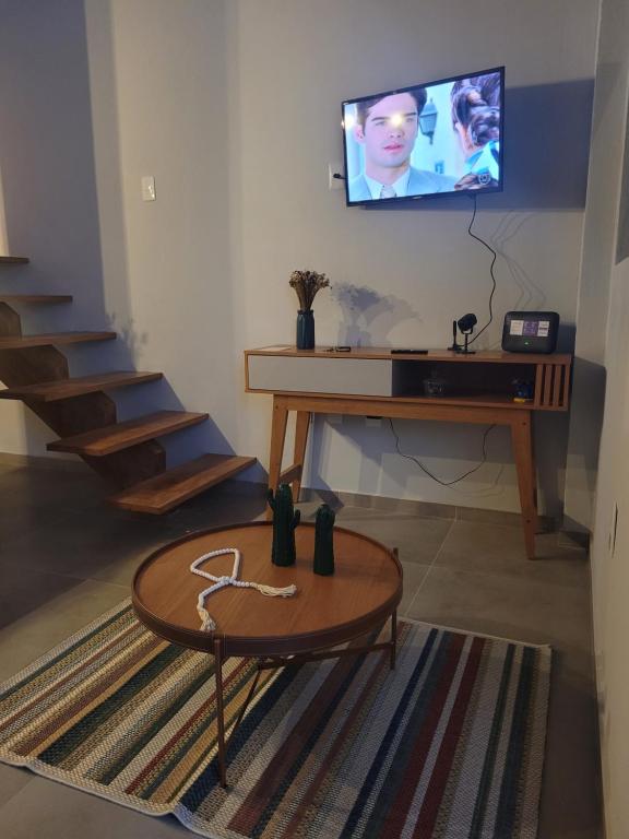 TV a/nebo společenská místnost v ubytování loft das flores