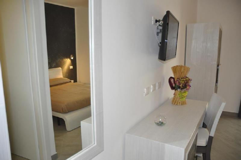 A bed or beds in a room at B&B Il Sole