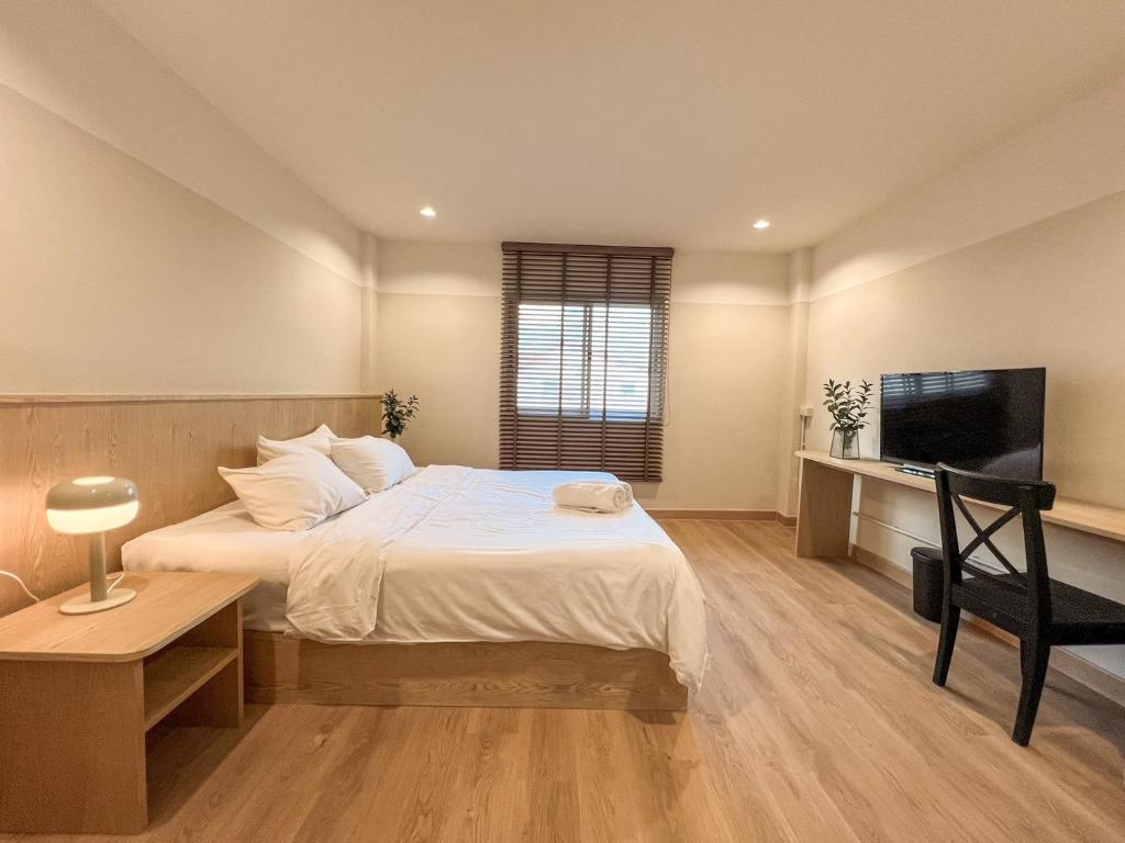 Кровать или кровати в номере Vanilla house